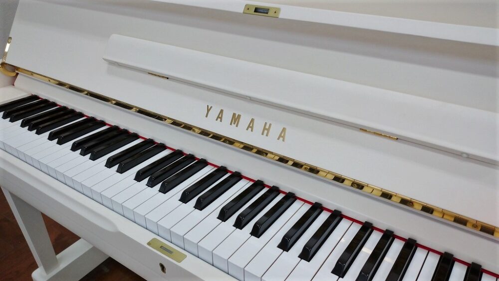 Used piano U1A brand mark/keyboard